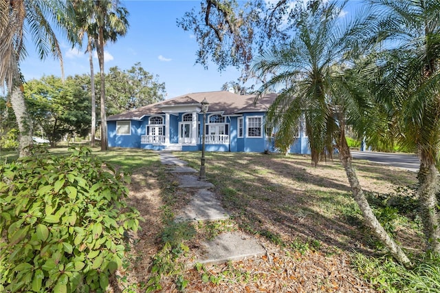 ranch-style house with french doors