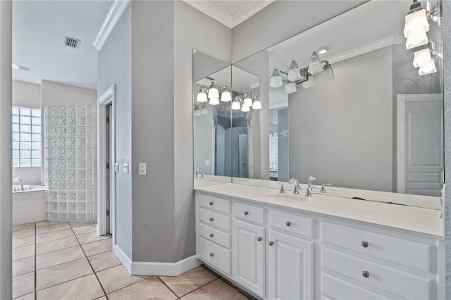 bathroom with vanity, tile patterned floors, and crown molding