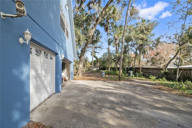 view of home's exterior with a garage