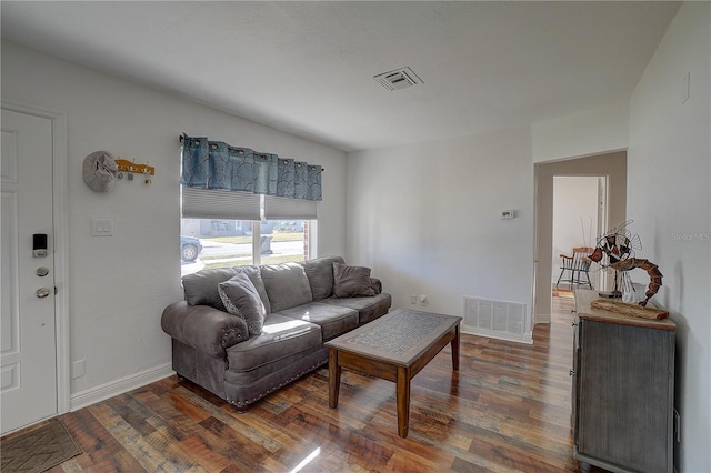 living room with dark hardwood / wood-style floors