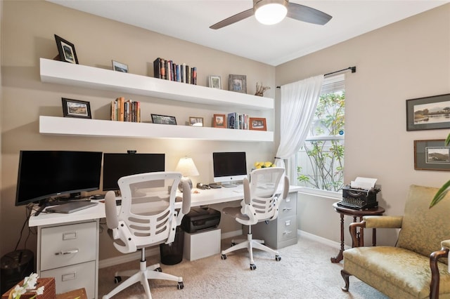 office with light carpet and ceiling fan