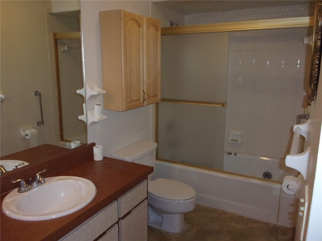 full bathroom with toilet, vanity, and bath / shower combo with glass door