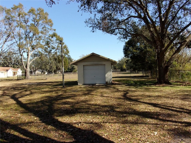 view of yard with a garage