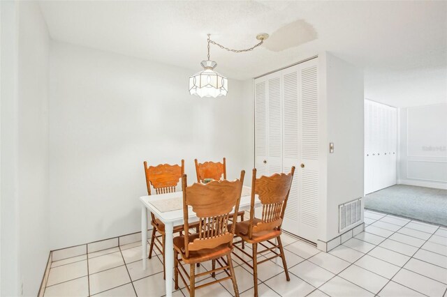 view of tiled dining space