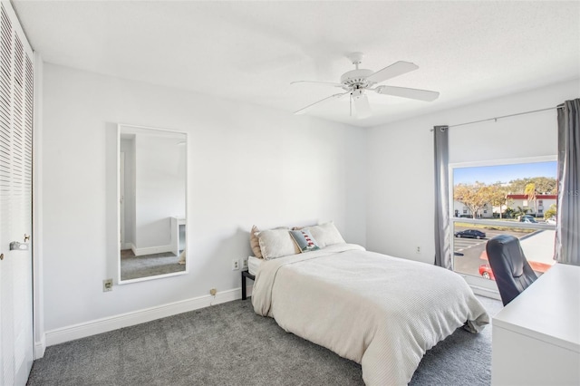 bedroom featuring ceiling fan and carpet flooring