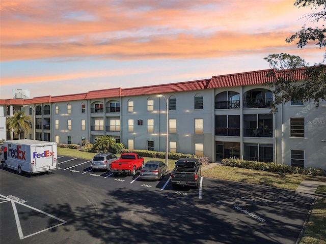 view of outdoor building at dusk