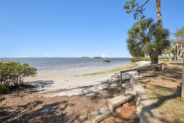 view of water feature with a beach view