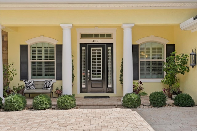 entrance to property with covered porch