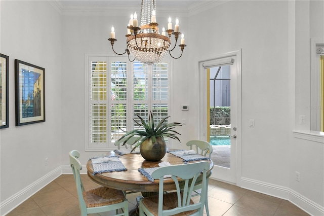 dining room with crown molding, tile patterned floors, and a notable chandelier