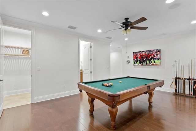 recreation room with hardwood / wood-style floors, crown molding, and ceiling fan