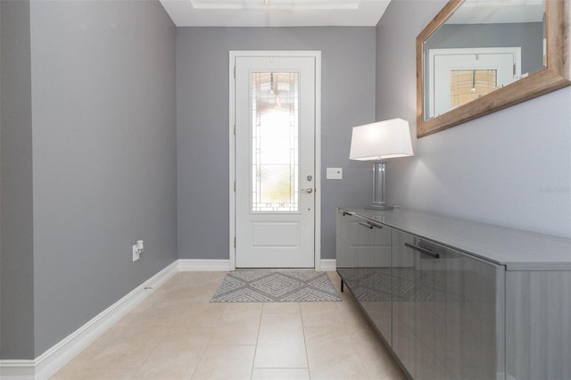 entrance foyer featuring light tile patterned flooring