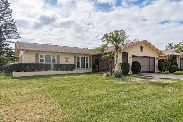 ranch-style home featuring a garage and a front yard