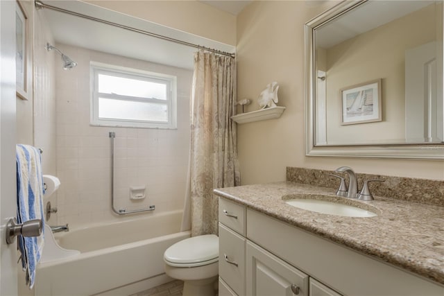 full bathroom with vanity, toilet, and shower / bath combo