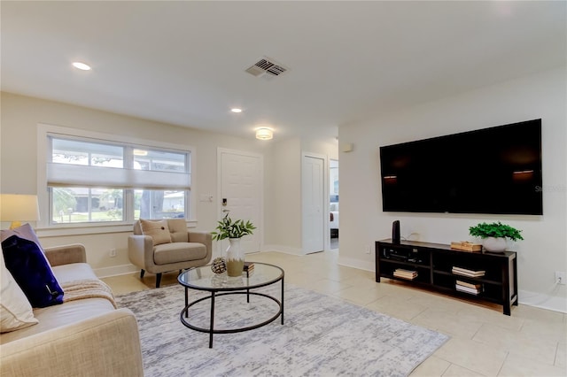 living room featuring light tile patterned floors