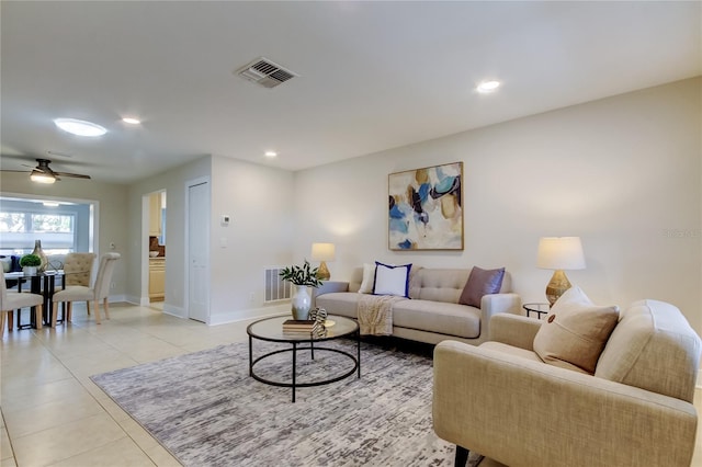 living room with light tile patterned floors and ceiling fan