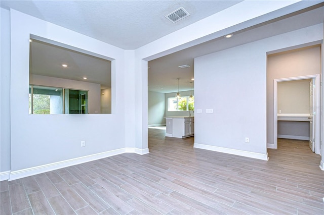 empty room featuring light wood-type flooring