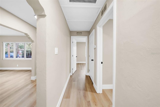 corridor featuring light hardwood / wood-style flooring