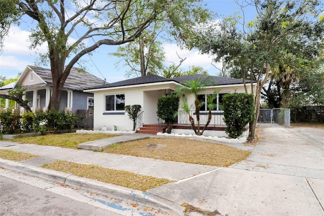 view of front of property featuring covered porch