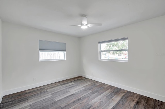 unfurnished room with hardwood / wood-style flooring and ceiling fan