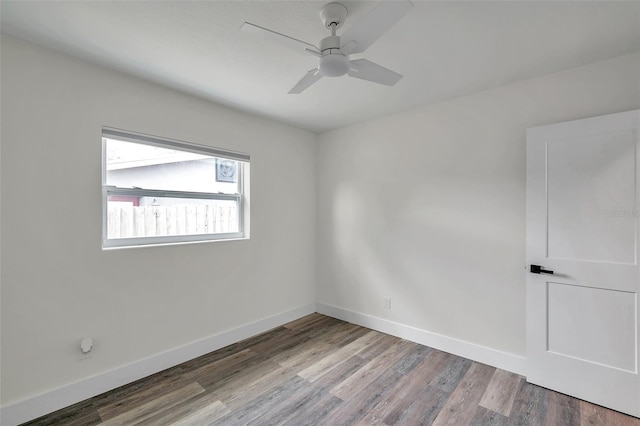 unfurnished room with ceiling fan and light wood-type flooring