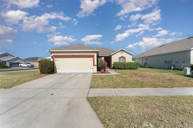 single story home featuring cooling unit, a garage, and a front lawn