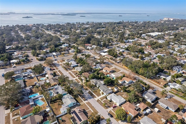 bird's eye view with a water view and a residential view