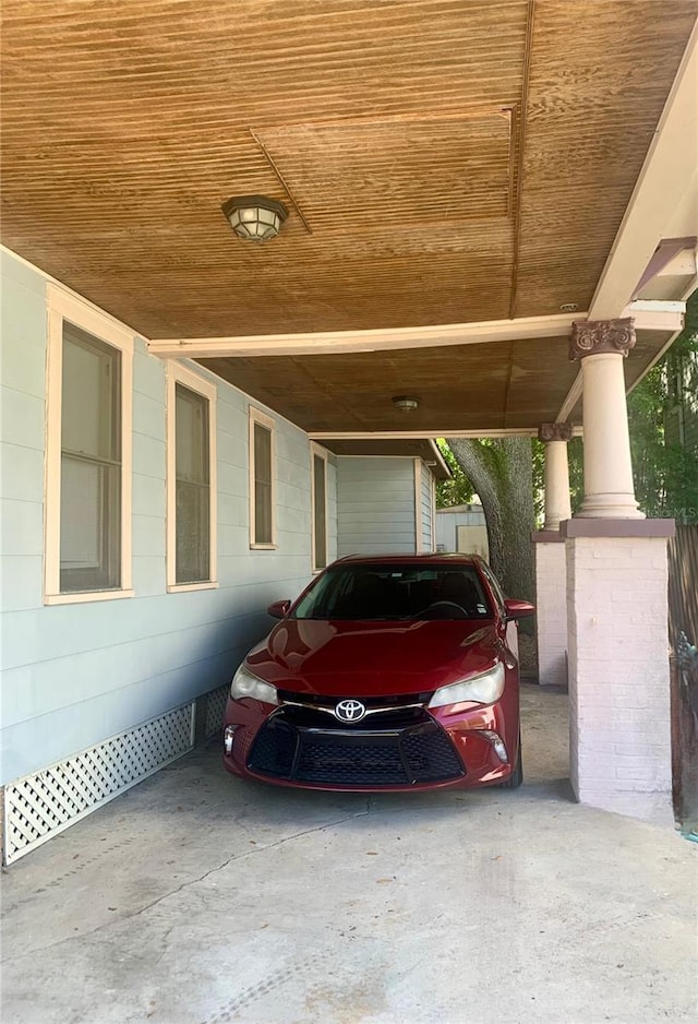 view of car parking featuring a carport