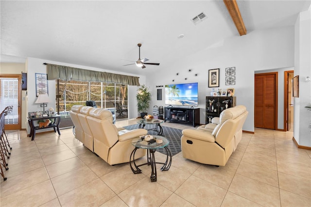 tiled living room with beamed ceiling, ceiling fan, high vaulted ceiling, and a wealth of natural light