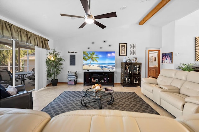 living room with ceiling fan, lofted ceiling with beams, and light tile patterned floors