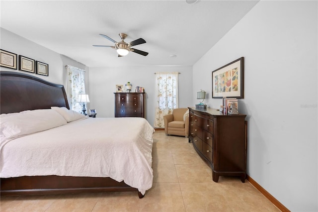 tiled bedroom with ceiling fan