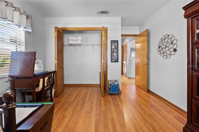 home office featuring light hardwood / wood-style flooring