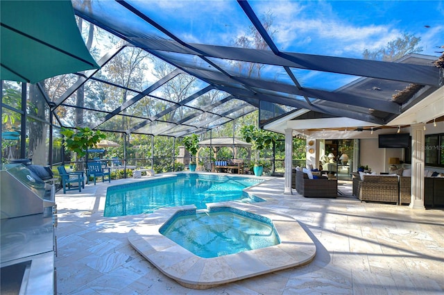 view of pool with an in ground hot tub, outdoor lounge area, glass enclosure, and a patio