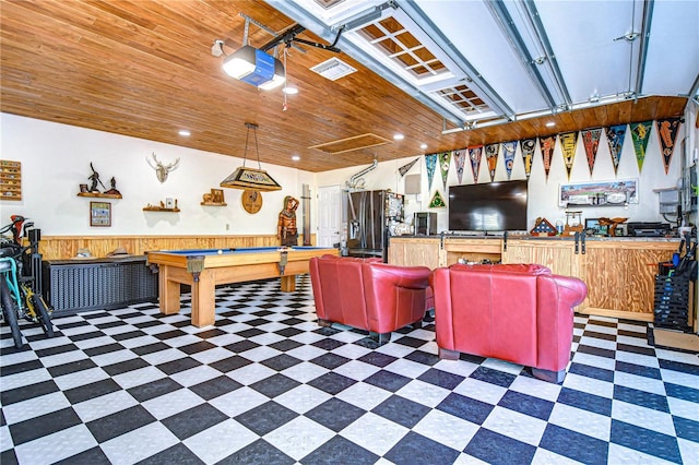 recreation room featuring wood walls, pool table, and wooden ceiling