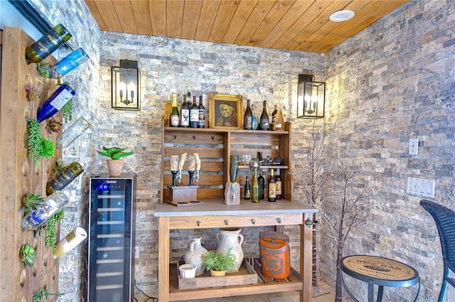 bar with wooden ceiling and beverage cooler