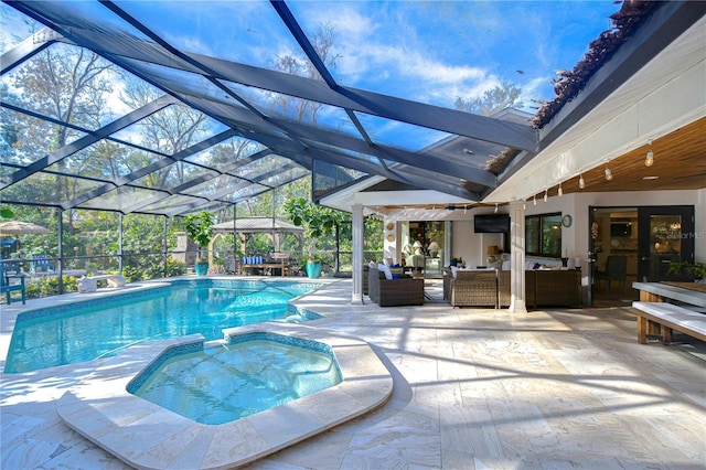 view of swimming pool with a patio, outdoor lounge area, an in ground hot tub, a lanai, and a gazebo