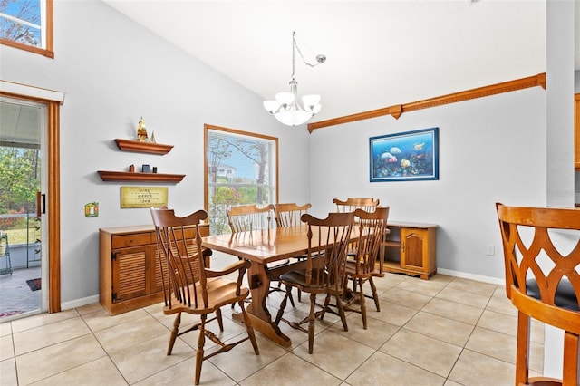 dining room with vaulted ceiling, light tile patterned floors, and a chandelier