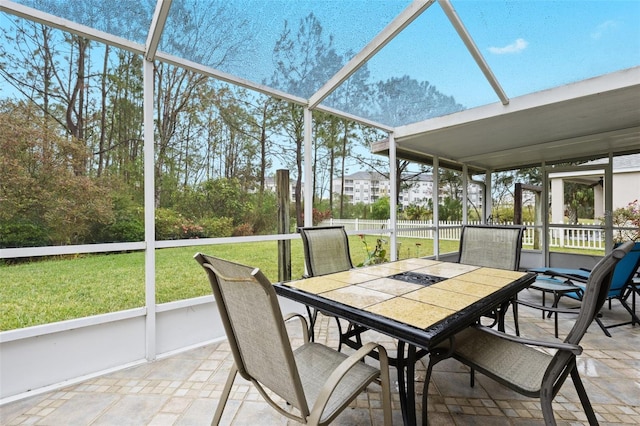 sunroom / solarium featuring plenty of natural light