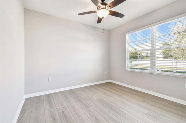 unfurnished room featuring ceiling fan and light hardwood / wood-style floors