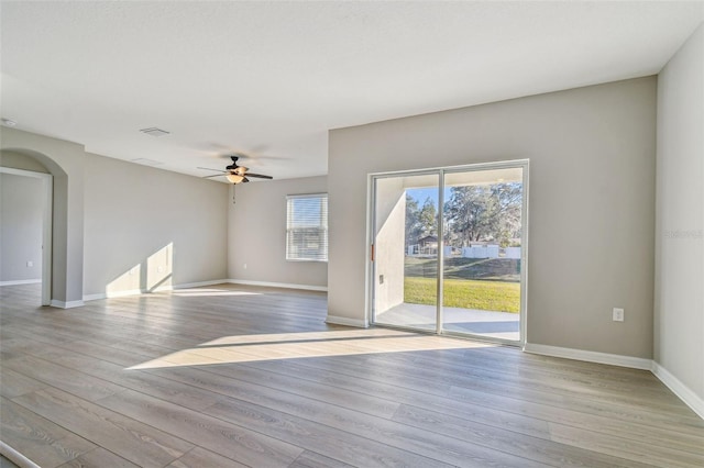 unfurnished room with ceiling fan and light hardwood / wood-style floors