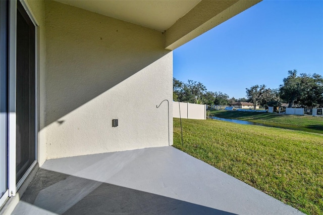 view of patio / terrace featuring a water view