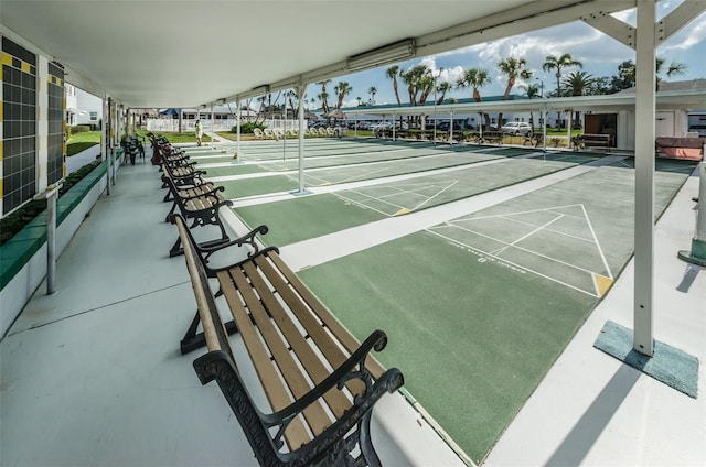 view of home's community with shuffleboard