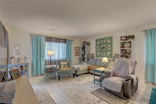 living room featuring a textured ceiling and light tile patterned flooring