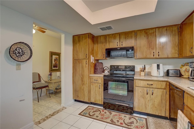 kitchen with light tile patterned floors, ceiling fan, and black appliances