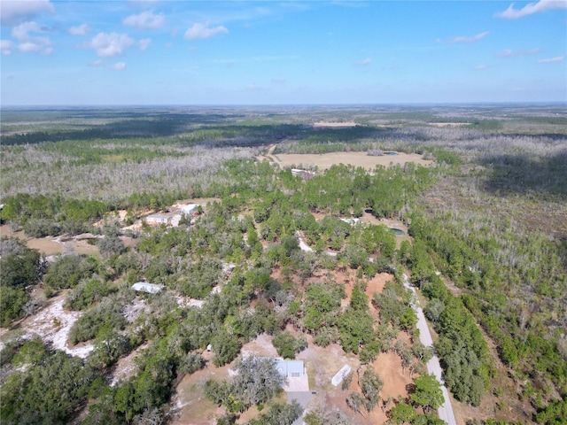 aerial view with a wooded view