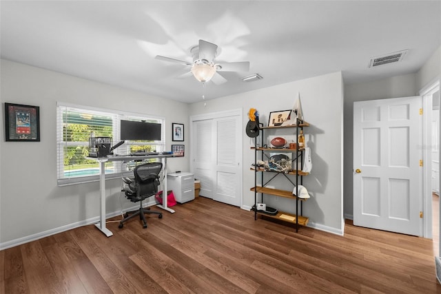 office space featuring hardwood / wood-style flooring and ceiling fan