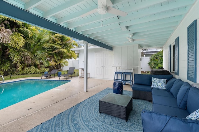 view of pool with an outdoor hangout area, ceiling fan, and a patio area