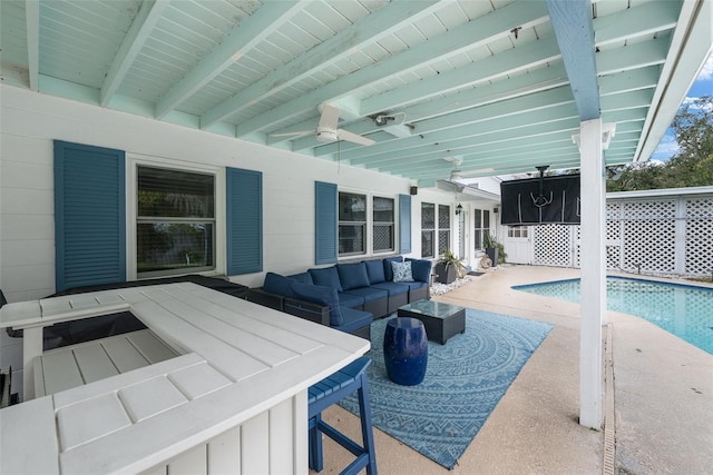 view of pool featuring an outdoor hangout area, ceiling fan, and a patio area