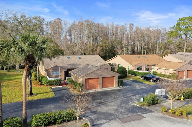 ranch-style home with a garage