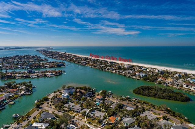 aerial view featuring a view of the beach and a water view