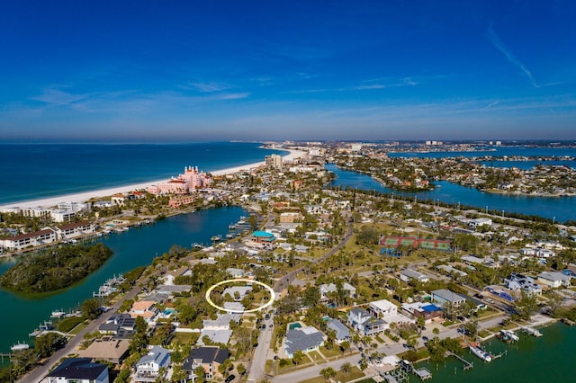 birds eye view of property featuring a view of the beach and a water view